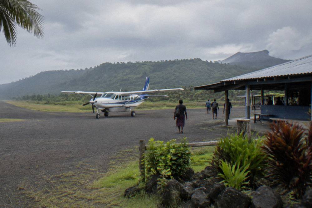 A small aircraft on the airstrip at Whitegrass Airport on Tanna Island